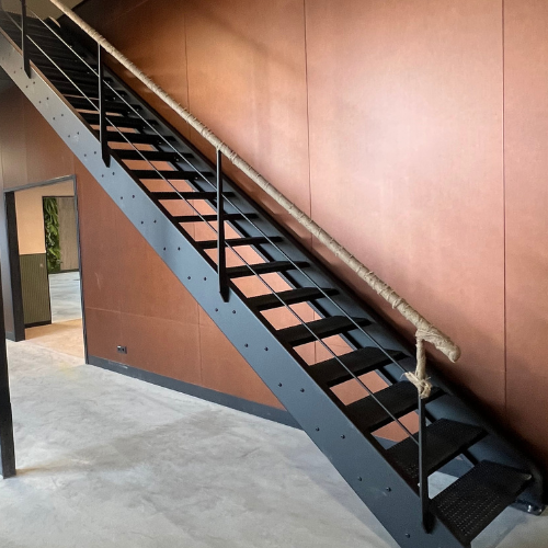 Custom steel industrial stairs with rope railing manufactured by Dutch Innovation Systems